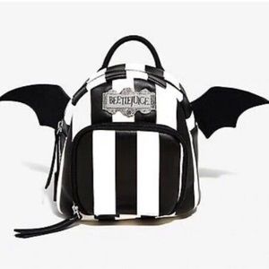 Beetle juice striped bat winged mini backpack.